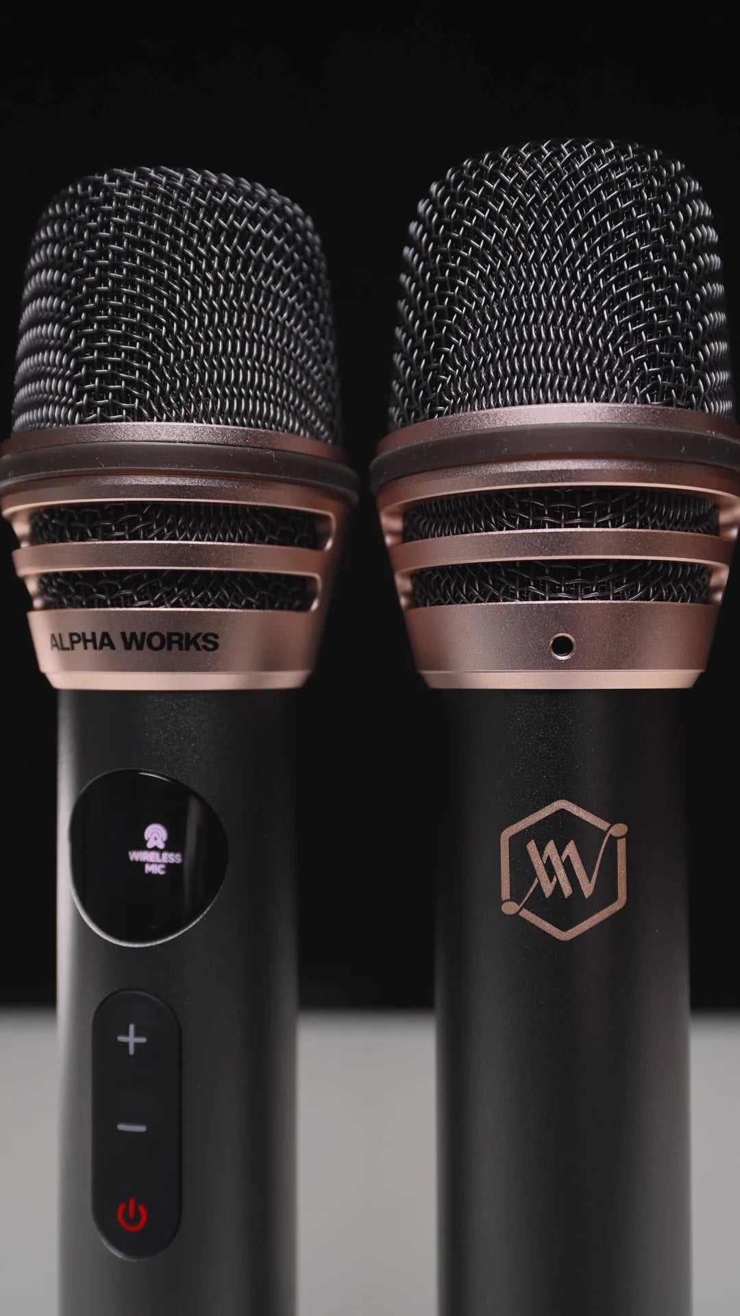A close view of the two wireless microphones included with W99